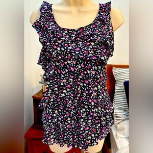 Sleeveless Petite Floral Top with layers of fabric.